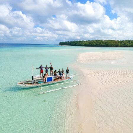 people riding on boat during daytime